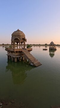 Gadisar lake in Jaisalmer at sunet, Rajasthan India. Slow motion