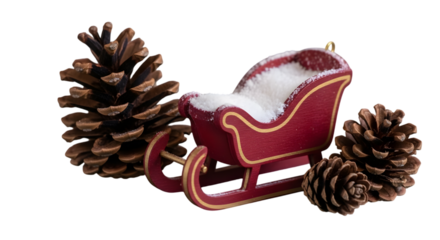 Red Christmas Sleigh with Snow and Pine Cones Festive Holiday Decoration Cut Out PNG.