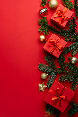 A Christmas-themed vertical flat lay with a side border of red gifts and fir branches on a red background.