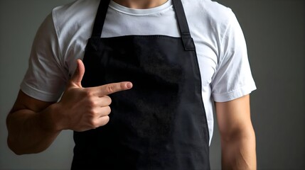 Man in Black Apron Over White T-Shirt Showcasing Garment with Professional Fit for Mockup