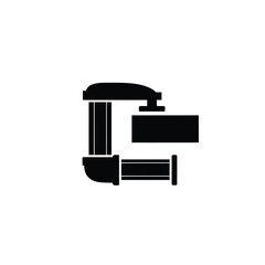 Black C clamp holding rectangular object c-clamp tool