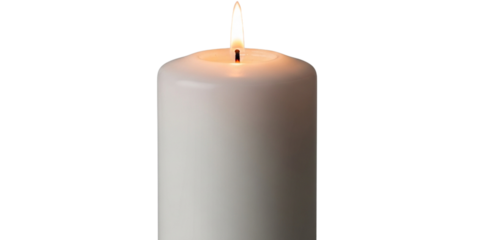 Close up of a single white pillar candle with a lit flame against a black background