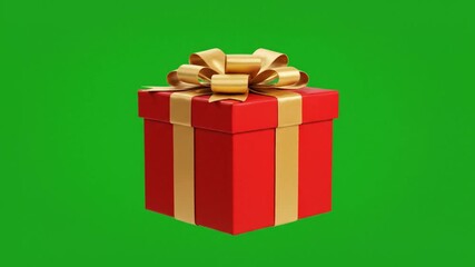 Vibrant red gift box with golden ribbon on a festive green screen background perfect for Christmas, birthdays, and special occasions video projects and marketing campaigns