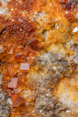 Beautiful mineral formation with blue and orange crystals discovered in natural stone