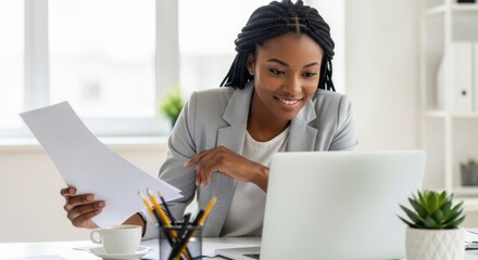 Focused Review: An insightful business professional at her desk, meticulously examining documents while using a laptop to make good decision 
