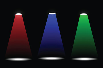 Three colored spotlights shine down on a dark background