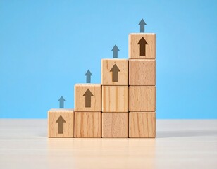 Ascending Wooden Block Columns with Upward Arrows on Light Blue Background Symbolizing Growth and Success