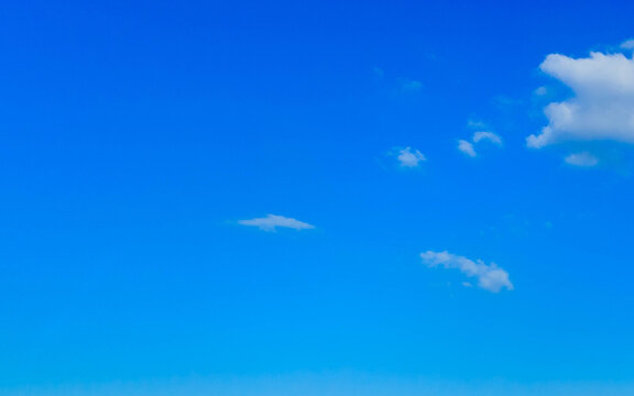 White clouds pon blue sky as a nature background.