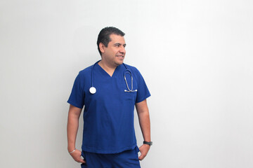 Dark-skinned Latino male doctor specialist with a stethoscope shows pride and success in his work...