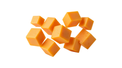 Pile of cubed cheddar cheese isolated on transparent background