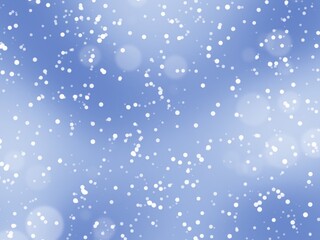 Snowfall on a blue blurred background