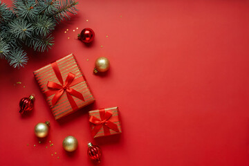Christmas Gift Boxes and Ornaments on Red Background – Festive Holiday Flat Lay