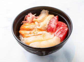 Exquisite seafood donburi with fresh tuna and salmon slices promising a delicious culinary experience for discerning palates
