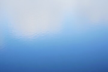 Abstract pixelated gradient of blue and white hues