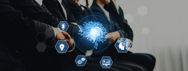 Group of professionals in business attire seated and engaged in a meaningful discussion about artificial intelligence and its impact on future technologies and business innovation. Trope