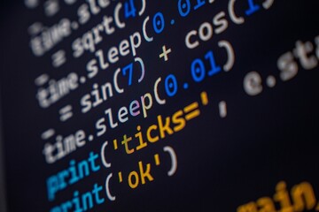 A detailed view of programming code displayed on a computer screen, showcasing syntax highlighting in various colors.