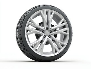 Fototapeta premium This sleek silver alloy wheel features a detailed and modern design, prominently displayed on a simple white background, highlighting its elegance and craftsmanship