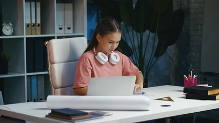Focused girl drawing architectural blueprint for school project, creative study - Powered by Adobe