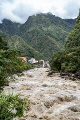 Scenic dramatic view with the powerful waters of Urubamba River crossing the Sacred Valley in Aguas Calientes