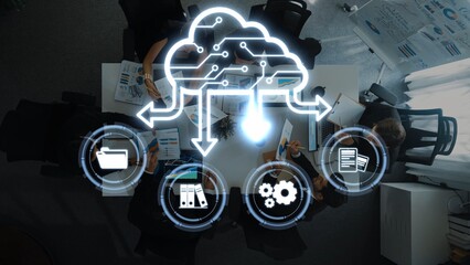 A diverse team collaborates in a modern office setting, utilizing cloud technology and data management tools to enhance productivity and foster innovation among participants. Raster