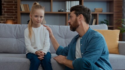 Caucasian family at home caring father support comforting sad daughter stressed upset child kid girl empathy supporting talking helping childcare problem parenting protection advice psychology help