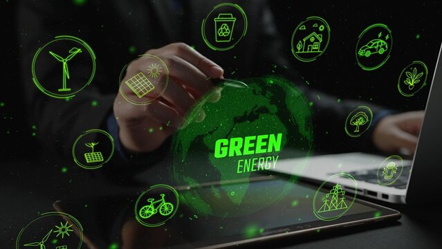 A businessman engages with green energy icons in a digital setting, illustrating the connection between technology and sustainable solutions for a better future. Cipher