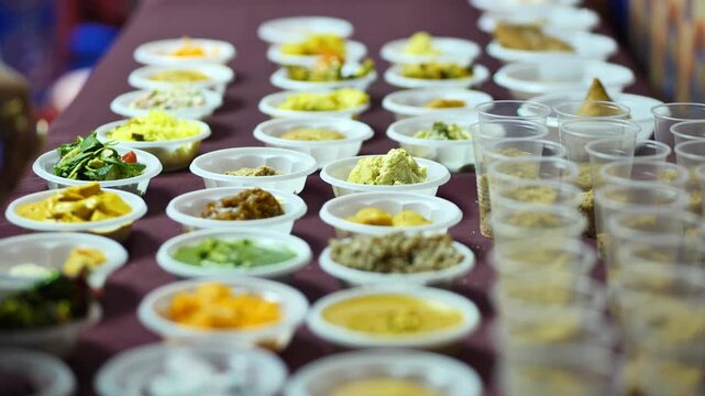 Indian festival Ganesha Chaturthi offering prasadam food in small bowls on a table