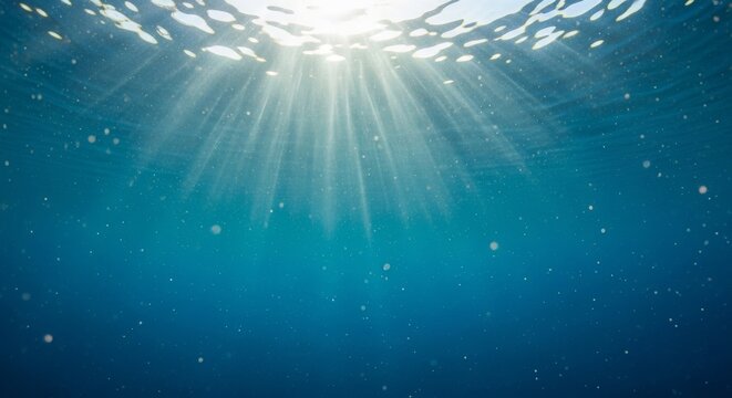 Dive into crystal blue waters with sunbeams creating an ethereal underwater paradise, perfect for travel, adventure, and serene wellness visuals, feeling refreshed and invigorated by the ocean - Powered by Adobe