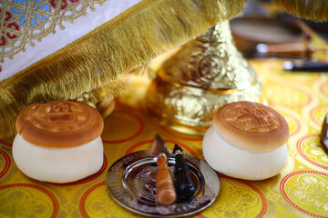 Chalice for communion and prosphora, liturgical bread, on the altar during the Orthodox liturgy in...