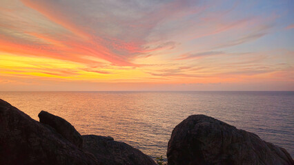 Tropical sunset at Cape Ja Te Kang in the south of Island Ko Tao, Surat Thani, Thailand, Southeast Asia.