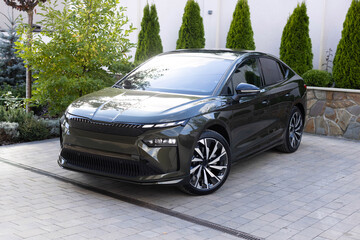 Modern electric SUV car. Exterior details. Exterior of electric ev car. Front view car parked. Car for sale and rent business concept. Automobile leasing and insurance concept