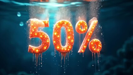Dynamic 50 percent sign with melting ice and bubbles in deep blue water for sale promotion