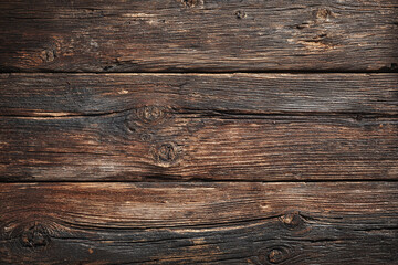 weathered wooden planks with visible grain and knots show a rustic texture