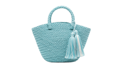 Light turquoise woven straw tote handbag with braided handles and decorative tassels, stylish summer beach and vacation bag for women, boho coastal fashion accessory isolated on white background

