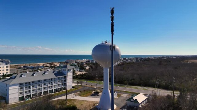 Cinematic Aerial Orbit on Water Tower and Communications Mast in Sandbridge, Virginia Beach