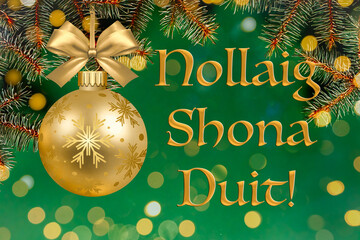 "Nollaig Shona Duit"  Merry Christmas in Irish. Blurred green irish color background of decorated Christmas tree with big golden ball. Bokeh. Celebration 25 December. Greeting postcard Ireland.