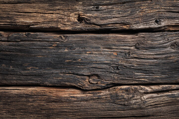 Obraz premium Aged weathered wood planks with deep grain and knots
