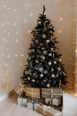 Decorated Christmas Tree with Gifts and Warm Holiday Lights