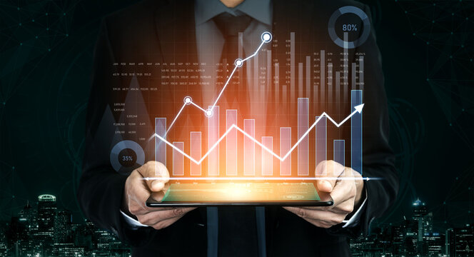 A business professional holds a tablet displaying financial graphs, symbolizing data analysis and growth amidst a modern urban backdrop, portraying success and innovation. Scalp