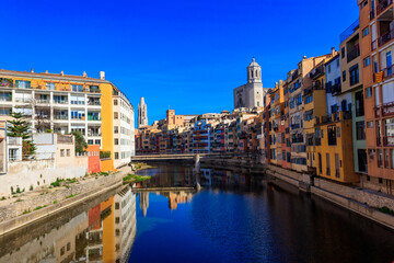 Colorful houses on the bank of the Onyar river in the old town of Girona, Spain