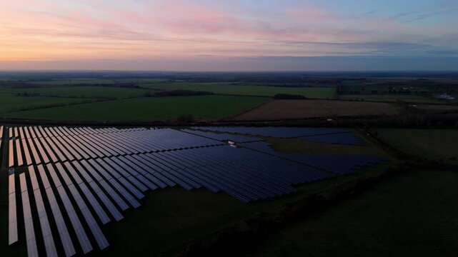 Aerial view of solar panels in fields, United Kingdom.