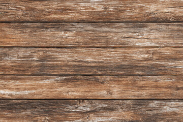 Fototapeta premium A close up view of weathered wooden planks with visible grain and texture