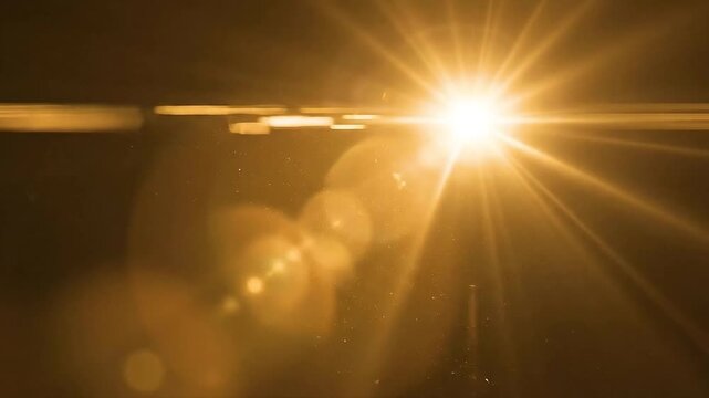 Bright golden optical lens flare effect, abstract light. warm