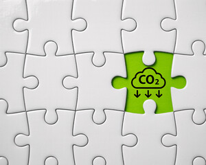 Fototapeta premium Complete the carbon emission puzzle to achieve sustainability and climate goals, a green solution to air pollution, crucial for the environment