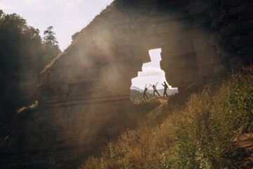 Happy travellers in sunny mountains. Amazing view, tourists enjoying themselves, living full life © Elena