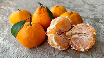 On table, the Okitsu Wase Satsuma, known for being an early-maturing, seedless mandarin with a rich...