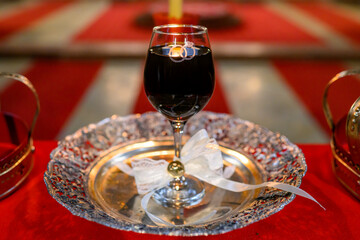 A glass of wine in the church for the wedding