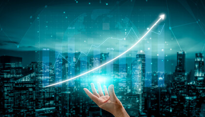 Business Growth Concept with Hand Reaching for Increasing Graph in Urban Background at Night Impute.