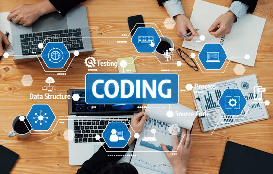 Teams collaborate in a modern workspace to explore coding concepts, focusing on data structure, testing processes, and source code analysis through interactive discussions. Amity - Powered by Adobe