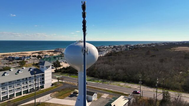 Cinematic Aerial Orbit on Water Tower and Communications Mast in Sandbridge, Virginia Beach